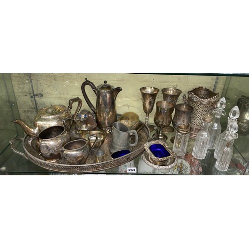 263 - SHELF OF VARIOUS PLATED WARES INC BOTTLE COASTER, HOTWATER JUG, THREE PIECE TEA SERVICE