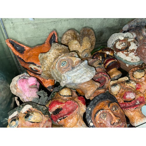 259 - SHELF OF INTERESTING POLYCHROME PAINTED PAPIER MACHE PUPPET HEADS