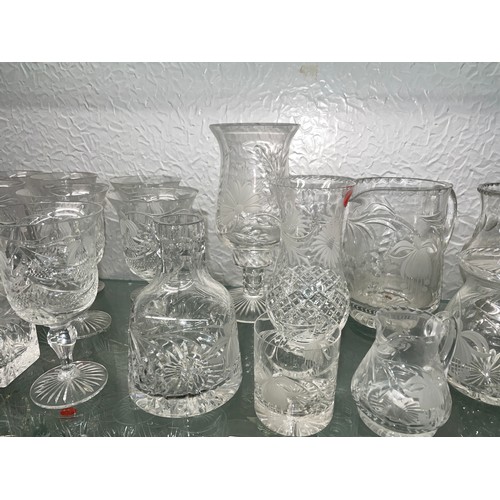 240 - SHELF OF CUT GLASS AND ETCHED FLORAL GLASSWARE INC. HURRICANE LAMP, DRINKING GLASSES, JUGS AND DISHE... 