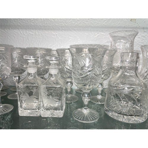 240 - SHELF OF CUT GLASS AND ETCHED FLORAL GLASSWARE INC. HURRICANE LAMP, DRINKING GLASSES, JUGS AND DISHE... 