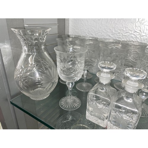 240 - SHELF OF CUT GLASS AND ETCHED FLORAL GLASSWARE INC. HURRICANE LAMP, DRINKING GLASSES, JUGS AND DISHE... 