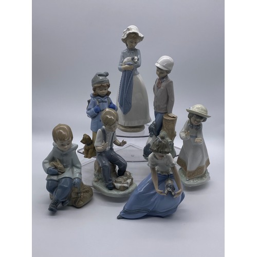 260 - SEVEN NAO PORCELAIN FIGURE GROUPS