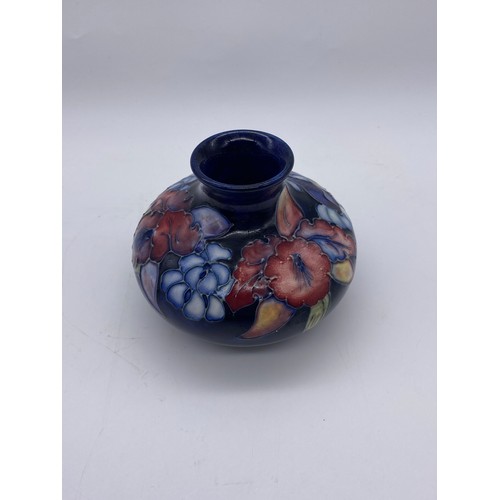 522 - MOORCROFT POTTERY ORCHID SQUAT VASE ON BLUE GROUND