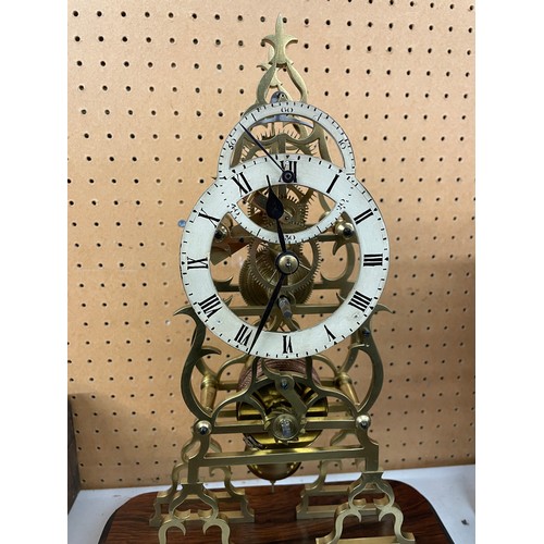 420 - BRASS SKELETON CLOCK UNDER GLASS DOME