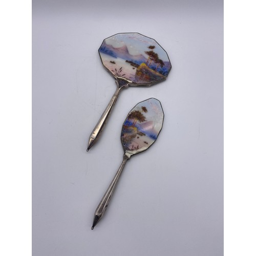 483 - SILVER AND ENAMELLED HAND PAINTED  BACKED HAND MIRROR AND BRUSH AS FOUND