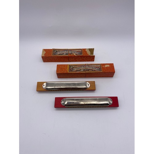 431 - TWO BOXED THE GUARDS BAND HARMONICAS