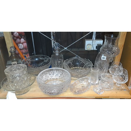 301 - SHELF OF CUT GLASS BOWLS, DECANTERS, HURRICANE LAMP