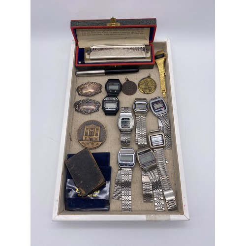 584 - TRAY OF VARIOUS DIGITAL WRISTWATCHES, CHROMATIC HARMONICA, SPIRIT LABELS AND A ROYAL SOCIETY OF ARTS... 