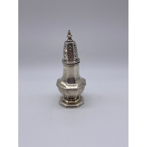 458 - LONDON SILVER OCTAGONAL PANELLED LIGHTHOUSE MINIATURE CASTOR 1.5OZ APPROX