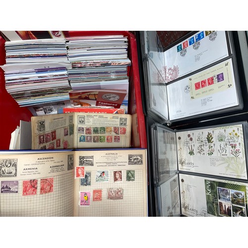 488 - TWO BINDERS OF GB POSTAGE STAMP FIRST DAY COVERS, ROYAL MAIL STAMP LEAFLETS, AND THREE WORLD STAMP A... 