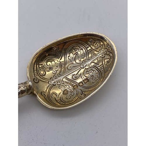 469 - LONDON SILVER PARCEL GILT ANNOITING SPOON 1OZ APPROX