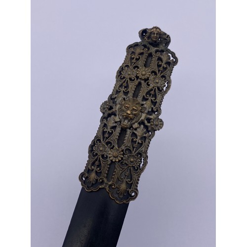 475 - EBONISED AND METAL FILIGREE WORK PAPER KNIFE