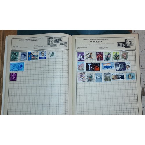 290 - LEDGER BOOK CONTAINING PUBLIC HOUSE BEER MATS AND A POSTAGE STAMP ALBUM