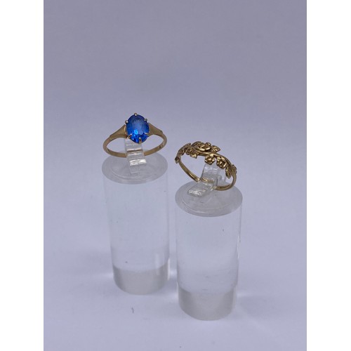 569 - 9CT GOLD ROSE DRESS RING AND A 9CT GOLD BLUE STONE RING 2.1G OVERALL APPROX