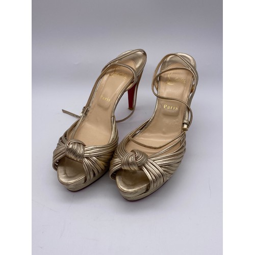 536 - PAIR OF LADIES CHRISTIAN LOUBOUTIN GOLD KNOT HEELS SIZE 40 IN DUST BAG