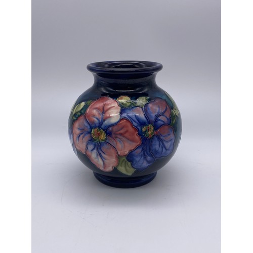 521 - MOORCROFT POTTERY ANEMONE BLUE GROUND GLOBULAR VASE