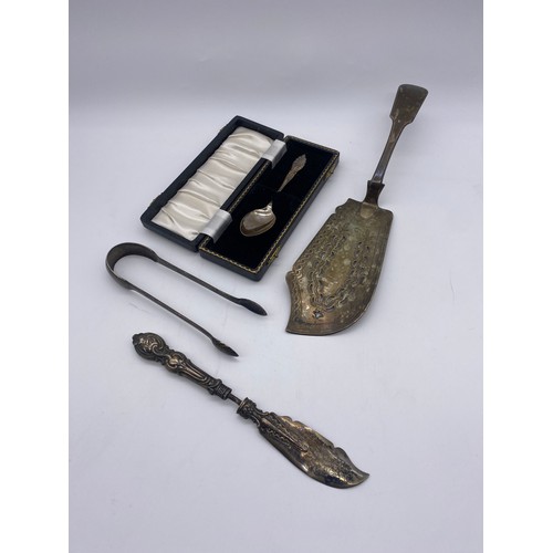 571 - CASED SILVER JAM SPOON, SILVER HANDLED PRESERVE KNIFE A/F, PAIR OF SUGAR TONGS AND A PLATED FISH SLI... 