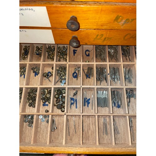 575 - TWO MULTI DRAWER CABINETS OF WATCH REPAIRERS PARTS AND SPARES