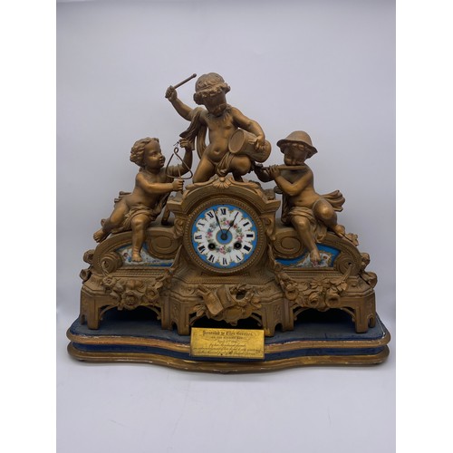 405 - 19TH CENTURY GILDED SPELTER AND PORCELAIN PANELLED CHERUB FIGURAL MANTLE CLOCK