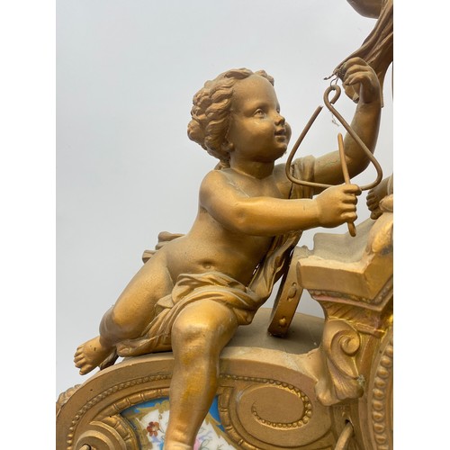 405 - 19TH CENTURY GILDED SPELTER AND PORCELAIN PANELLED CHERUB FIGURAL MANTLE CLOCK