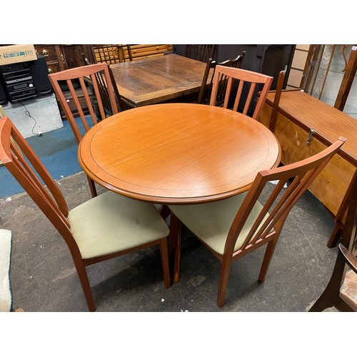 45 - CHERRYWOOD CIRCULAR PEDESTAL DINING TABLE AND FOUR UPHOLSTERED DINING CHAIRS