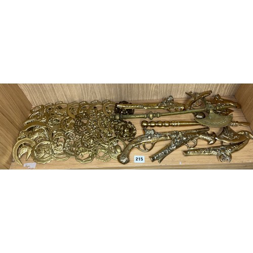 215 - LARGE SELECTION OF LOOSE HORSE BRASSES AND ORNAMENTAL WALL PISTOLS AND AXES