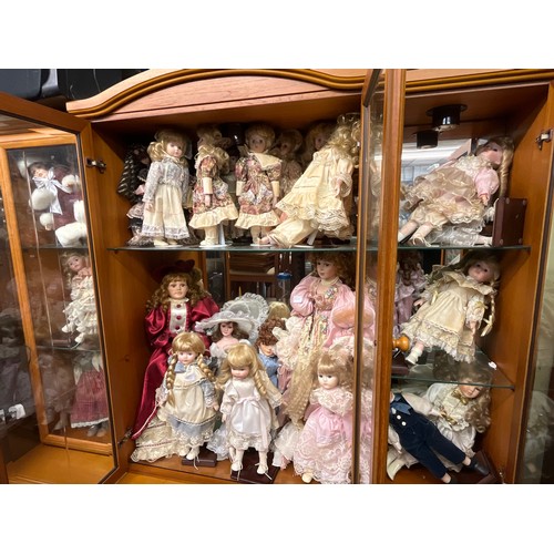 16A - APPROXIMATELY 24 VARIOUS PORCELAIN HEADED DRESS DOLL