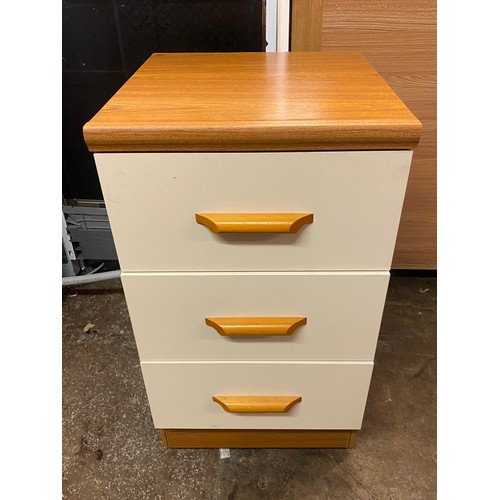 9 - TEAK EFFECT AND CREAM THREE DRAWER CHEST