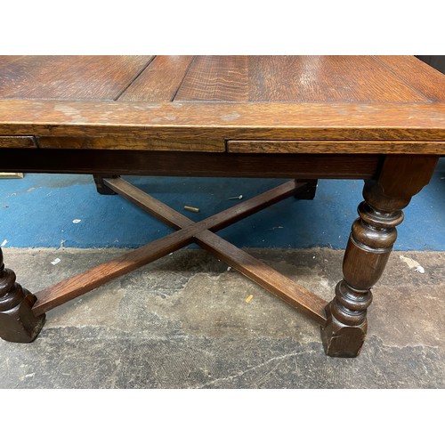 40 - LARGE OAK BULBOUS LEG DRAWER LEAF TABLE & SET OF CHAIRS