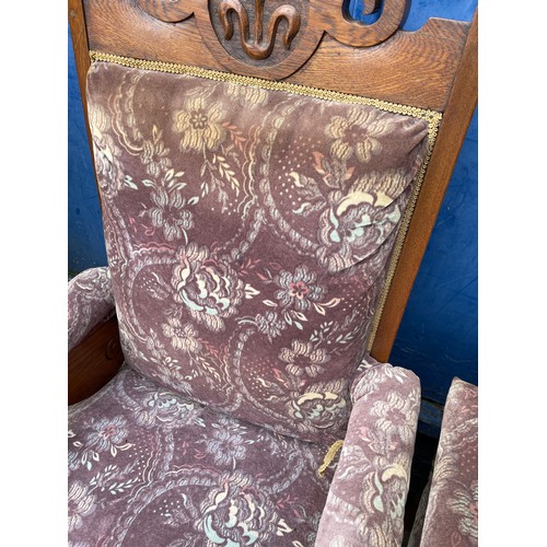 85 - PAIR OF CARVED OAK FRAMED UPHOLSTERED GENTLEMANS ARMCHAIRS