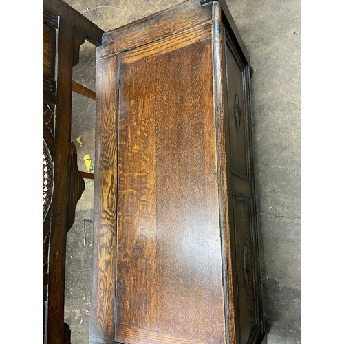 97 - OAK CARVED BERGERE CANED PANEL BACKED BOX SETTLE