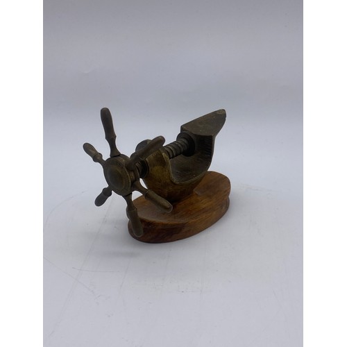 354 - METAL WORK LEAPING DOLPHIN, MINIATURE SCHOOL BELL, SHIPS WHEEL VICE AND MINIATURE SHIPS