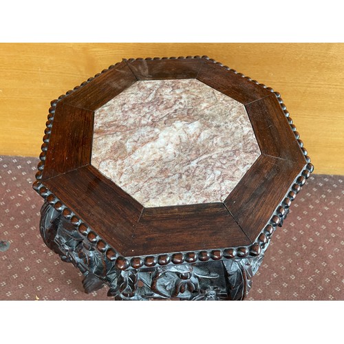 145A - CHINESE HARDWOOD CARVED OCTAGONAL JARDINIERE STAND INSET WITH MARBLE