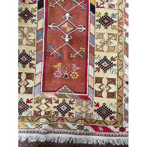 125A - EARLY 20TH CENTURY CAUCASIAN CARPET WITH GEOMETRIC PATTERNED CENTRE AND BORDERS