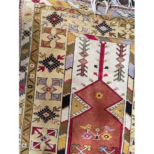 125A - EARLY 20TH CENTURY CAUCASIAN CARPET WITH GEOMETRIC PATTERNED CENTRE AND BORDERS