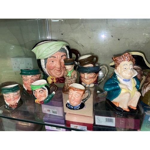 281 - SHELF OF ROYAL DOULTON, BESWICK, AND OTHER DICKENS CHARACTER JUGS