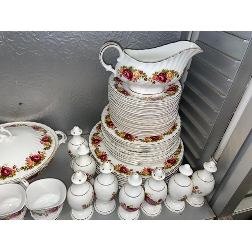 249 - TWO SHELVES OF ASHLEY AND OTHER BONE CHINA ROSE PATTERN DINNER AND TABLEWARES