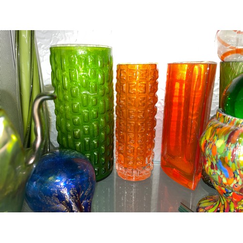 267 - HALF SHELF OF GREEN AND TANGERINE GLASS VASES, IRRIDESCENT BULB VASE, AND SPIL VASES