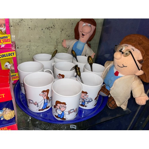 296 - SHELF OF BOXED TETLEY TEAFOLK FIGURES, MUGS ON TRAY AND FELT PUPPETS