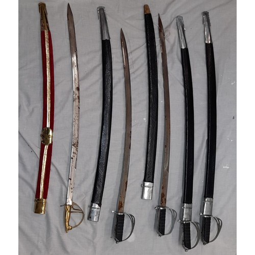 223 - FOUR REPRODUCTION CEREMONIAL SWORDS AND ONE OTHER IN RED SCABBARD