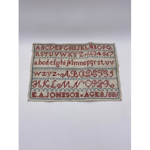 449 - NEEDLE POINT SAMPLER UNFRAMED WORKED BY E.A.JOHNSON AGED 8 1881 WITH CERTIFICATES