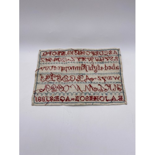 449 - NEEDLE POINT SAMPLER UNFRAMED WORKED BY E.A.JOHNSON AGED 8 1881 WITH CERTIFICATES