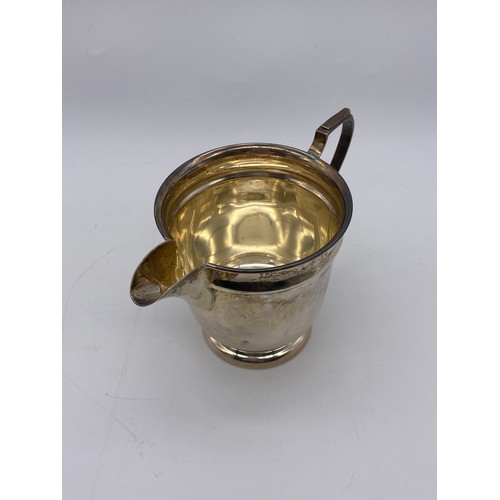 446 - SHEFFIELD SILVER CREAMER WITH STRAP HANDLE BY EDWARD VINER 2.7OZ APPROX