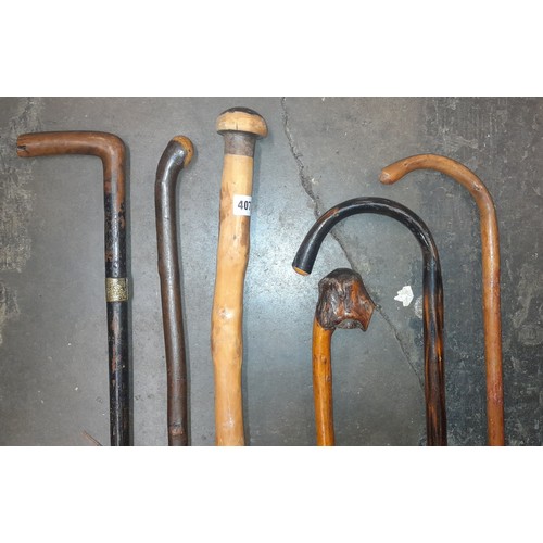 407 - BUNDLE OF WOODEN WALKING CANES AND STAFFS