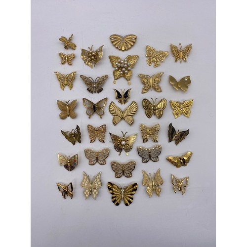 608 - BAG OF GOLD COLOURED BUTTERFLY BROOCHES