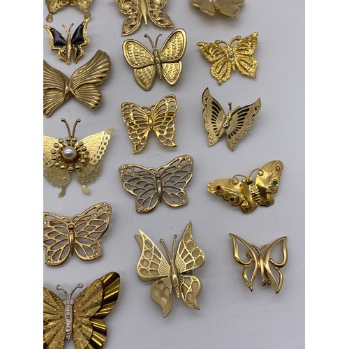 608 - BAG OF GOLD COLOURED BUTTERFLY BROOCHES