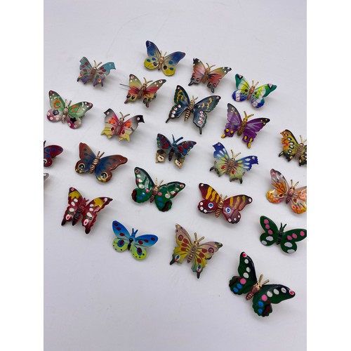 605 - BAG OF HAND PAINTED BUTTERFLY BROOCHES