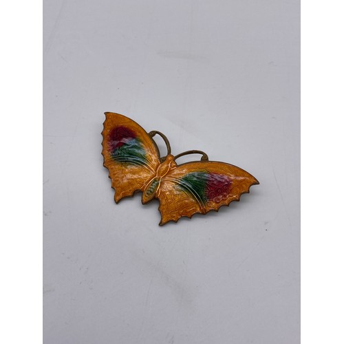 610 - BAG OF ENAMELLED BUTTERFLY BROOCHES