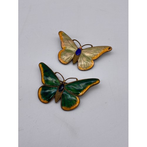 610 - BAG OF ENAMELLED BUTTERFLY BROOCHES