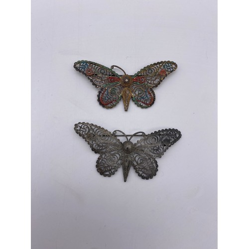 614 - BAG OF METALWORK FILIGREE AND ENAMELLED BUTTERFLY BROOCHES